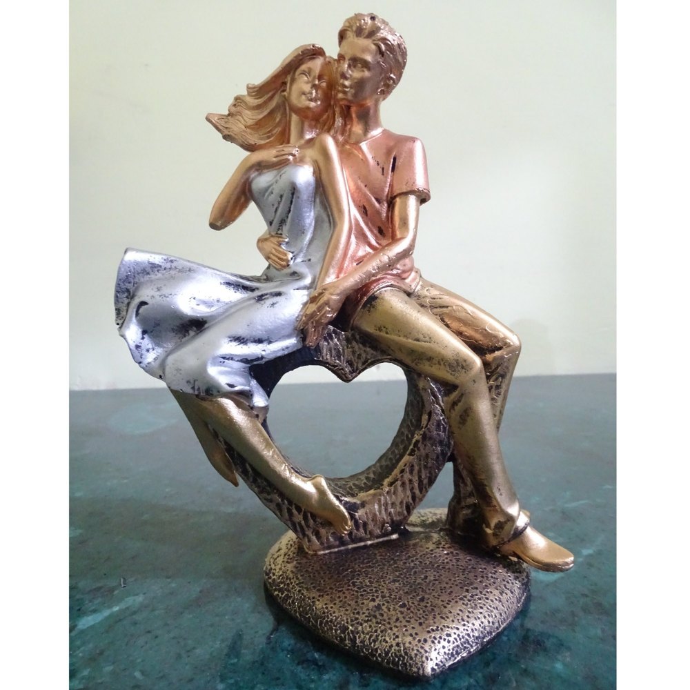 Silver Loving Couple Sitting On Heart 8 In Poly Resin, 6x8x4