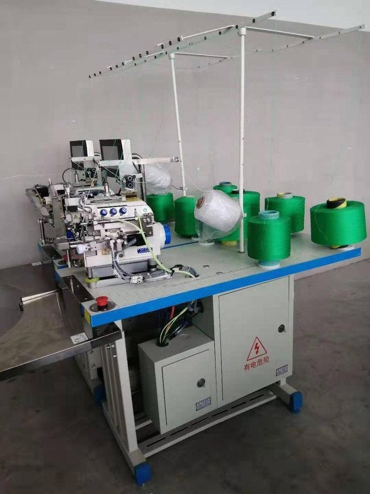 fully computerized glove overlock machine