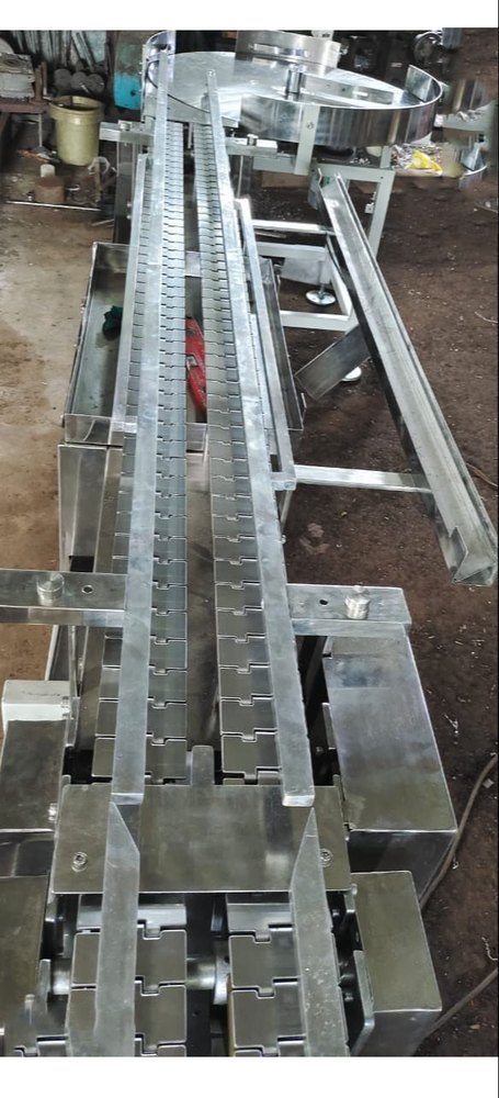 Stainless Steel Two Row Turn Table Slate Conveyor, Material Handling Capacity: 100kg/feet img